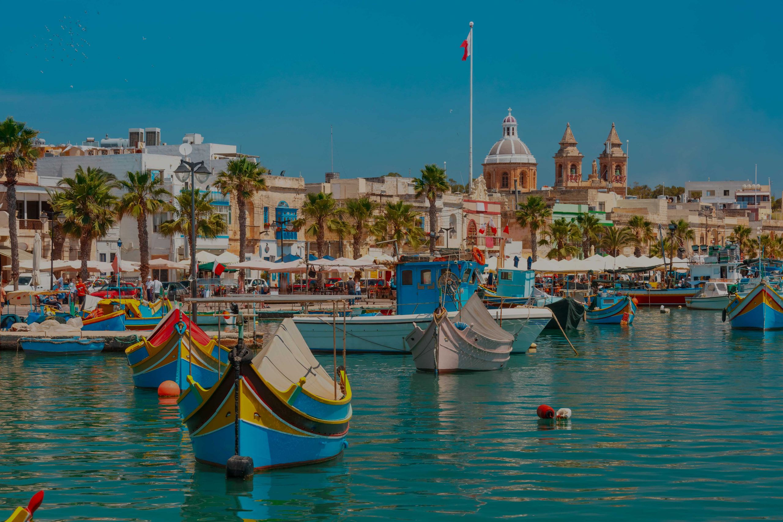 traditional-eyed-colorful-boats-luzzu-harbor-mediterranean-fishing-village-marsaxlokk-malta